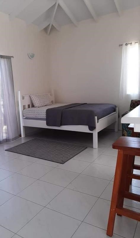 Studio Apartment For Rent In Beausejour st lucia bed