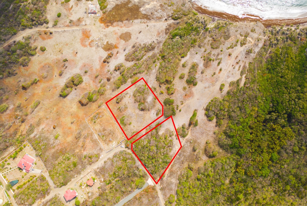 Two 1-acre beachfront facing land Lots available in Canelles